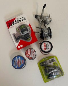 lot 22 image: Lot of Fishing Accessories Including Reel NIP