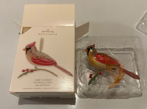 lot 55 image: 2010 Hallmark KEEPSAKE Lady Cardinal Christmas Ornament