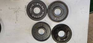 lot 8 image: Four 2.5LB 2-Inch Weight Plates (Used)