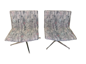 2 National Grin Swivel Chairs