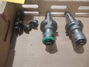 lot 276 image: (2) Cat 40 Tap Heads...