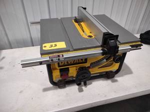 lot 33 image: Dewalt 10 Portable Tablesaw...