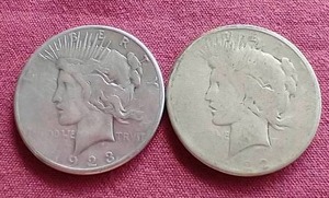 lot 12 image: (2) Lower Grade Peace Dollars - 1922 & 1923