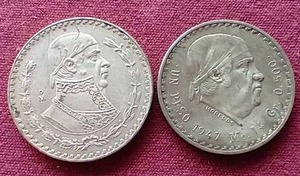 lot 17 image: (2) Vintage Partial Silver Mexican Pesos