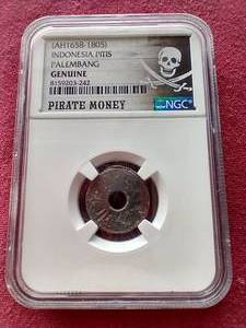lot 33 image: Vintage Indonesia Pirate Money - NGC Authenticated