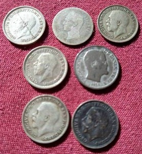 lot 66 image: (7) Small Silver Coins - Mostly British 3 Pence