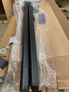 lot 13 image: Aries ActionTrac 80 Inch Power Running Boards for Dodge Ram Crew Cab