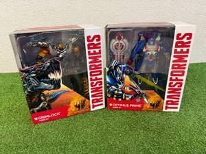 lot 2 image: Transformers Age of Extinction Grimlock & Optimum Prime