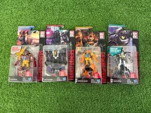 lot 55 image: Transformers Combiner Wars Rodimus, Skywarp, Wreck-Gar & Groove