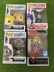 lot 159 image: Funko POP Doctor Doom, Invisible Girl, Optimus Prime & Supergirl