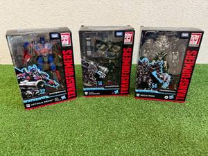 lot 122 image: Transformers Studio Series Megatron, Ironhide & Optimus Prime