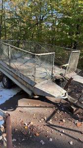 lot 335 image: small duck boatpontoon with flat bed trailer