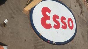 lot 382 image: Vintage Esso Oval Gas Station Sign with Red Lettering with metal frame 88 x 60