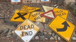 lot 397 image: Collection of Vintage Metal Road Signs including Dead End, Yield, and Stop Ahead