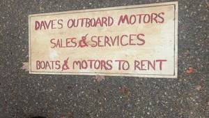 lot 401 image: Vintage Daves Outboard Motors Painted Wood Sign