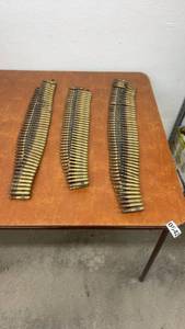 lot 847 image: Lot of Belted Rifle Ammunition Rounds in Three Strips