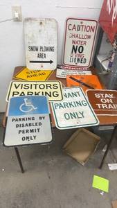 lot 891 image: Collection of 8 Used Road and Parking Lot Signs