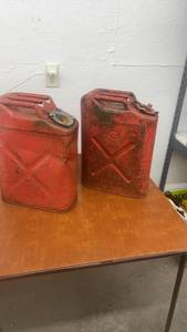 lot 1751 image: Pair of Vintage Red Metal Jerry Gas Cans