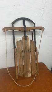 lot 1760 image: Vintage Wooden Snow Sled with Metal Runners and Rope Pull