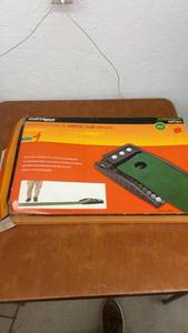 lot 1809 image: Golf Digest Putting Mat with Electric Ball Return