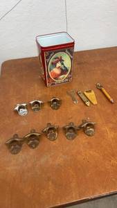 lot 1820 image: Vintage Bottle Opener Collection with Wall Mounts and Coca-Cola Tin