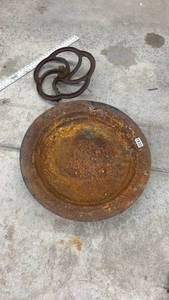 lot 1830 image: Vintage Cast Iron Flywheel and Large Rusted Metal Basin