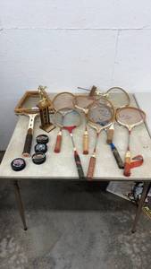 lot 1860 image: Vintage Tennis Racket Collection with Hockey Pucks and Trophy