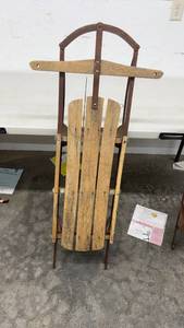 lot 1868 image: Vintage Wooden Snow Sled with Metal Runners