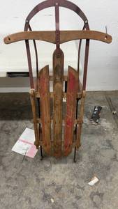 lot 1869 image: Vintage Wooden Snow Sled with Red Accents