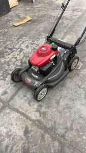lot 1888 image: Honda HRX217 Versamow Self-Propelled Lawn Mower- Used once