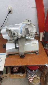 lot 1896 image: Univex Duro Meat Slicer with Instruction Manual