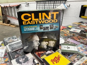 lot 1899 image: Large Collection of Music CDs and Movie DVDs with Clint Eastwood Gift Set