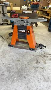 lot 1260 image: RIDGID JP06101 6-Inch Jointer Planer with Mobile Base and Magnetic Jig