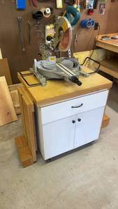 lot 1263 image: Makita LS1013 10-Inch Sliding Compound Miter Saw with Custom Rolling Stand and Extension Table