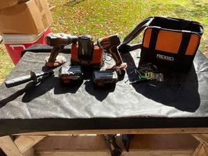 lot 1293 image: Ridgid 18V Power Tool Set with Drill, Impact Driver, Reciprocating Saw, 3 Batteries, Charger, Bag, and Bits