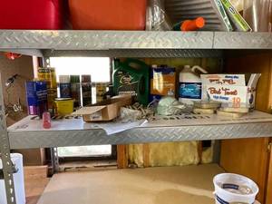 lot 1294 image: Garage Shelf Lot with Quaker State Oil, Mineral Spirits, Paint Supplies, and Hardware
