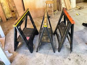 lot 1314 image: Set of 3 Folding Plastic Sawhorses with Wood Tops
