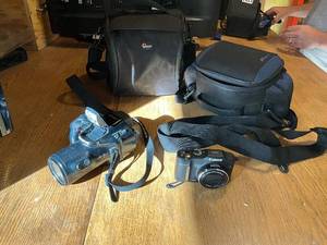 lot 1335 image: Canon PowerShot SX160 IS and Olympus IS-3 DLX Camera Bundle with Bags
