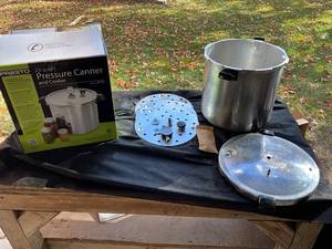lot 1356 image: Presto 23-Quart Pressure Canner and Cooker with Accessories