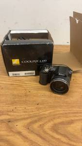 lot 303 image: Nikon Coolpix L100 Digital Camera with Box and Accessories