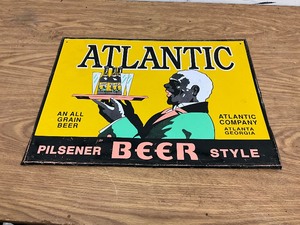 lot 439 image: Atlantic Oil Gasoline Embossed Metal Sign