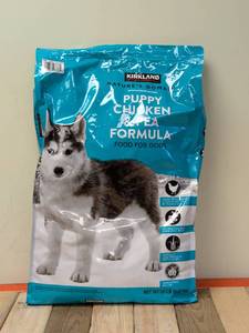 lot 166 image: KIRKLAND SIGNATURE NATURES DOMAIN PUPPY CHICKEN & PEA FORMULA