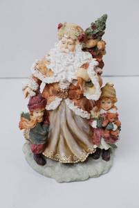 lot 15 image: Santa Claus Figurine with Children and Toys