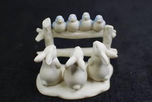 lot 25 image: Lot of Porcelain Animal Figurines - Bunnies, Pigs, and Children in Costumes