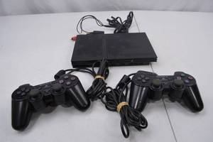 lot 101 image: Sony PlayStation 2 Slim Console with LEGO Star Wars II Game and 2 Controllers (Missing Power Cord)