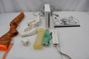 lot 107 image: Nintendo Wii Console with Controllers, Sensor Bar, and Accessories