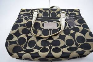 lot 203 image: Coach Poppy Signature Black and Tan Canvas Tote Bag