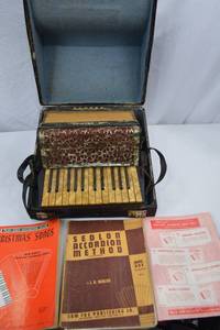 lot A-235 image: Vintage Accordion with Case, Lesson Books and Sheet Music