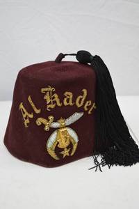 lot 265 image: Shriner Al Kader Maroon Fez with Tassel and Embroidered Emblem