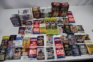 lot 57 image: Sports and Wrestling Trading Card Lot - Open Packs with Cards Inside